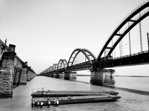 Photo bridge over river