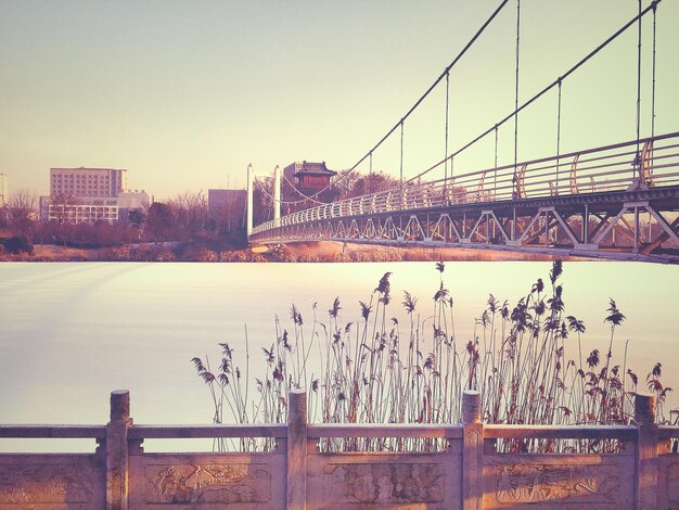 Photo bridge over river