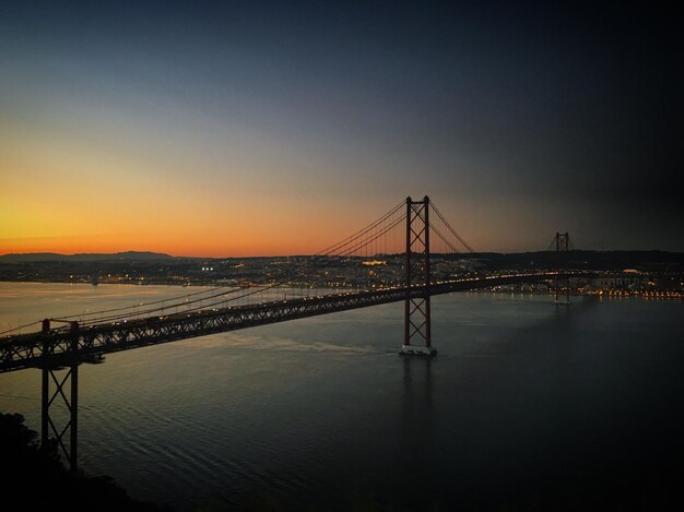 A bridge that is in the middle of a river