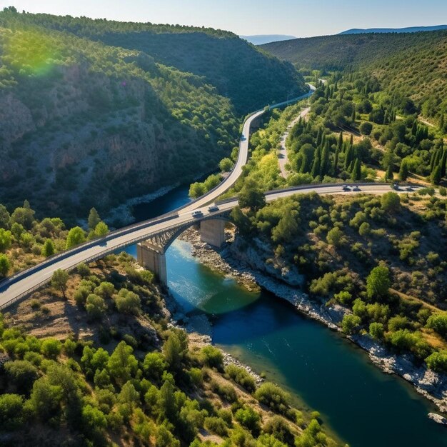 a bridge that is over a river that has a car on it