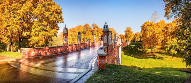 Bridge in the tsaritsyno in moscow over the ravine on a sunny autumn day