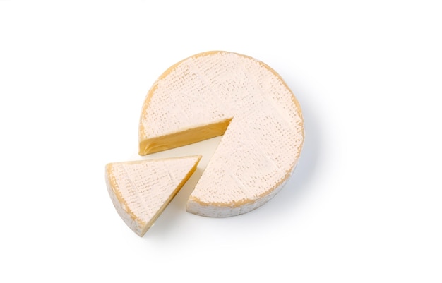 Brie cheese with cut slice isolated