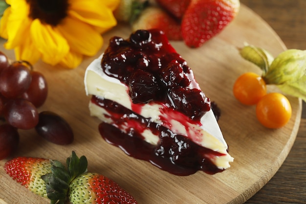 Brie cheese with red fruit jam,