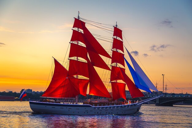 Brig with scarlet sails in the waters of the neva river\
rehearsal for the graduation party saint petersburg russia june 25\
2021