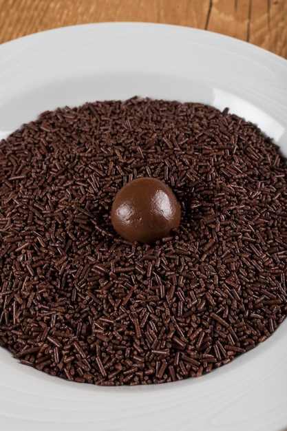 Brigadeiro a brazilian sweet over chocolate sprinkles