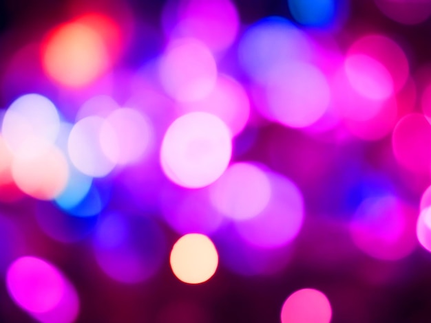 Photo bright abstract circular bokeh background blur on a dark background of new year's eve