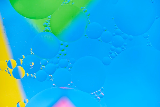 Bright abstract multicolored background with oil circles