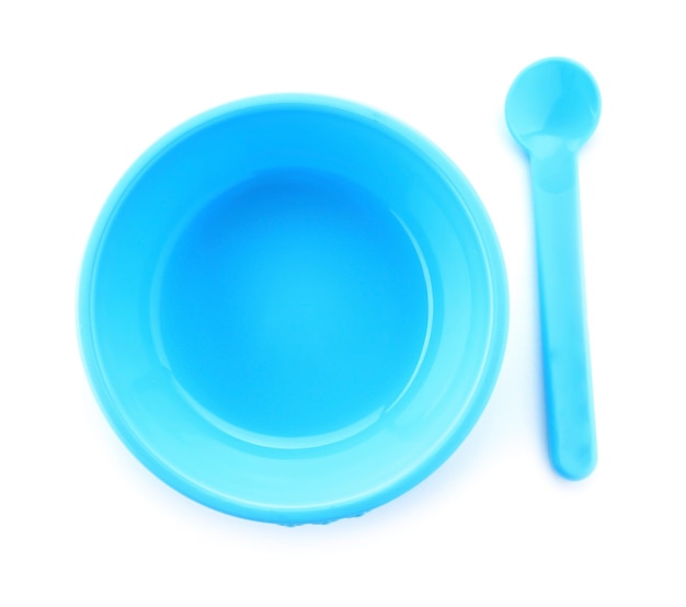 Bright baby tableware on white background