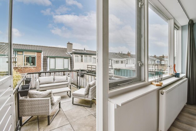 Bright balcony with chair and door