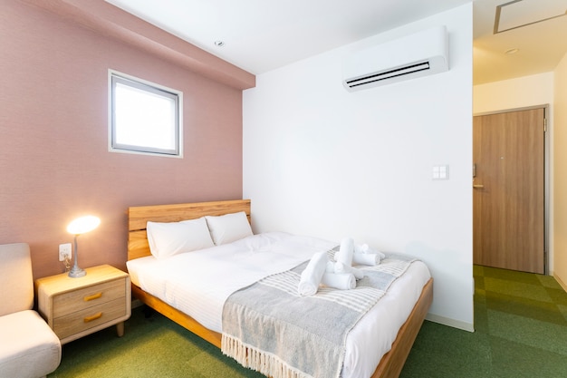 Bright bedroom with white sheets in the room