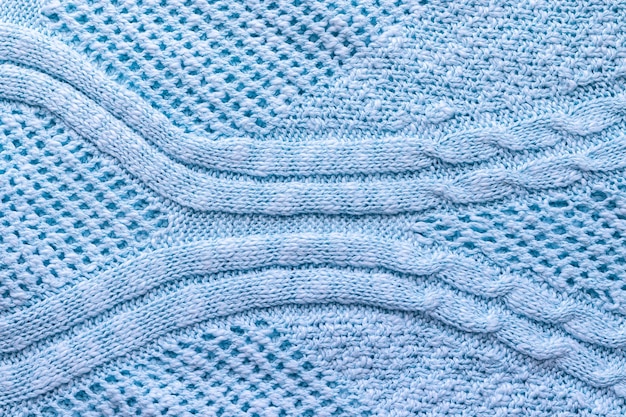 Bright blue knitted fabric texture