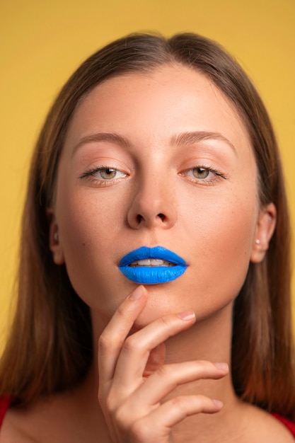 Photo bright blue lips portrait with copy space