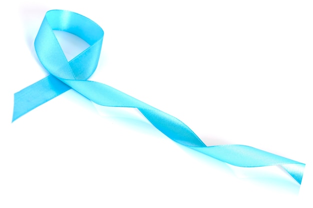 Bright blue satin ribbon on white surface