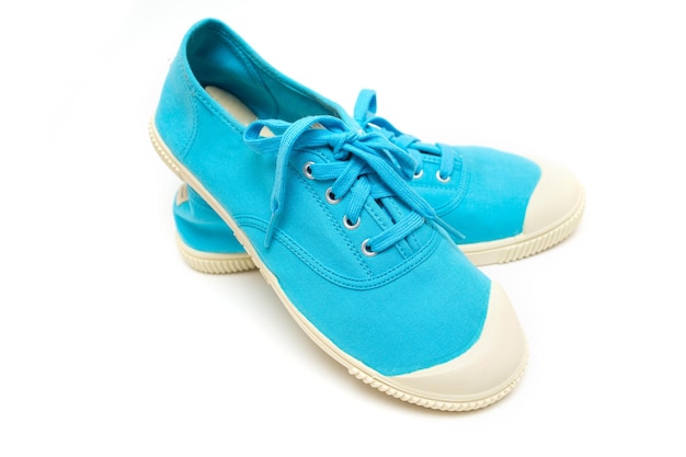 Bright blue sneakers on a white background