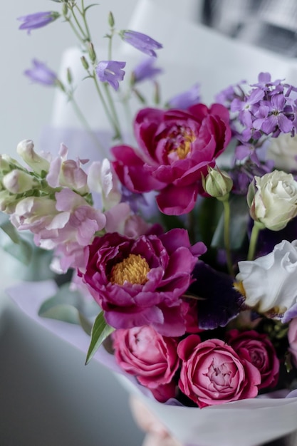 Bright bouquet of flowers in hands