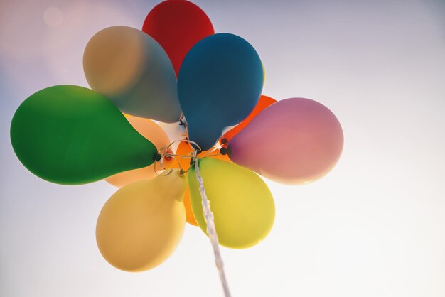 bright bunch of Colorful balloons at sunset