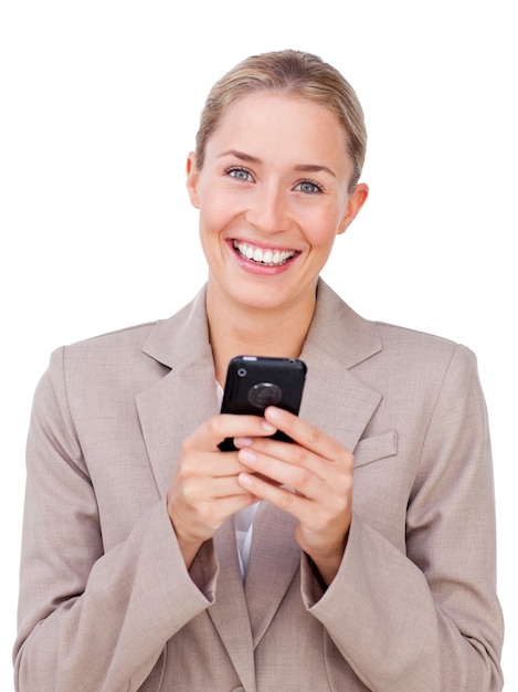 Bright businesswoman sending a text 