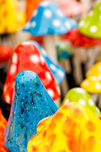 Bright ceramic mushrooms for decorating garden