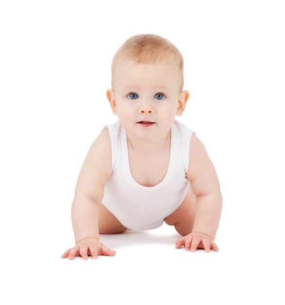 bright closeup picture of crawling baby boy.