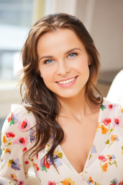 bright closeup picture of smiling woman at home