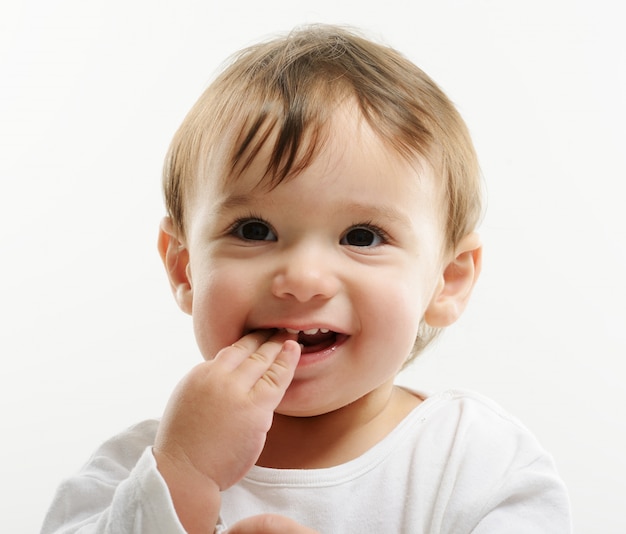 Bright closeup portrait of adorable happy baby