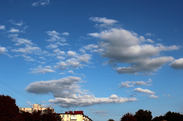 Bright cloudy blue sky over the cityscape