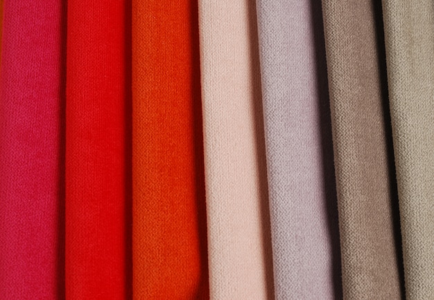 Bright collection of colorful velour textile samples.