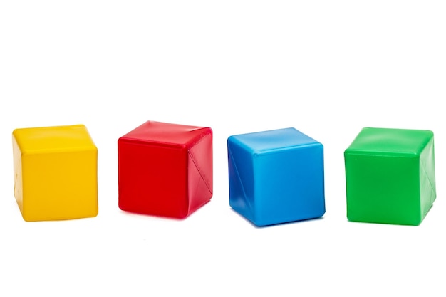Bright colored childrens cubes isolated on white background