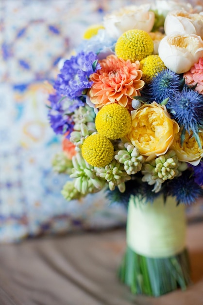 Bright colorful italy wedding bouquet with orangeyellow white and blue flowers Sicily wedding concept