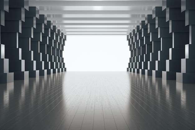 Bright concrete tunnel interior with black columns