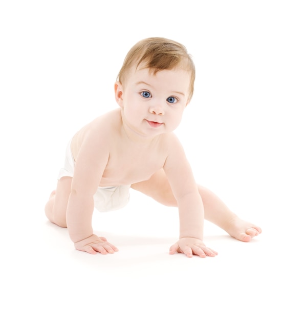 bright crawling baby boy in diaper