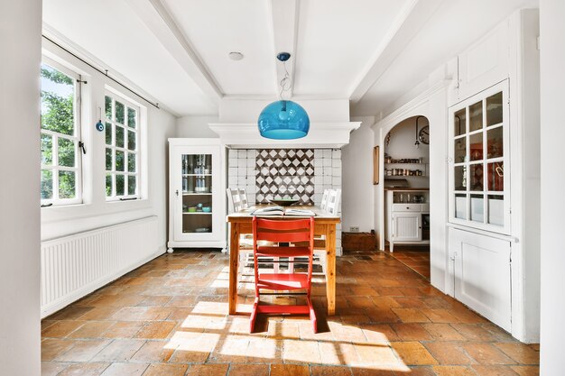 Bright dining room with decorative table and chairs