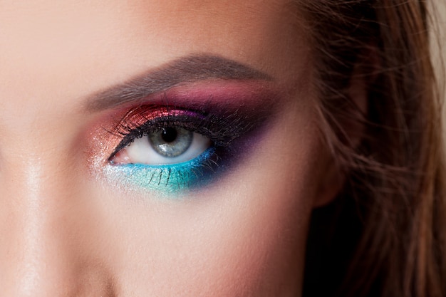 Bright eye makeup. Pink and blue color, colored eyeshadow.