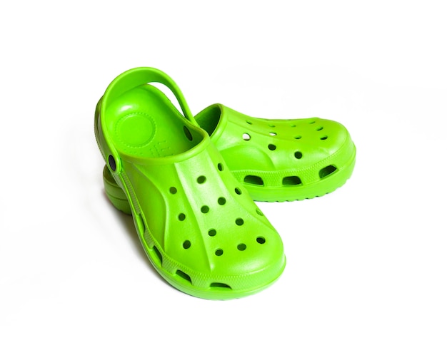 Bright green clogs isolated