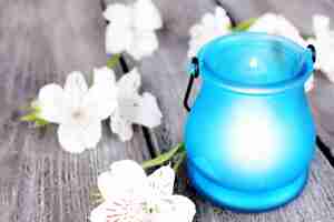 Photo bright iconlamp with flowers on wooden background