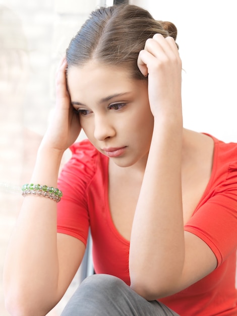 bright indoors picture of calm teenage girl