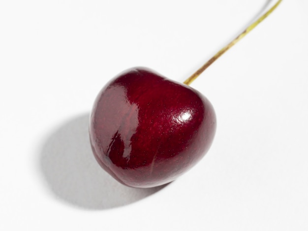 Bright juicy ripe cherry berry isolated on a white background