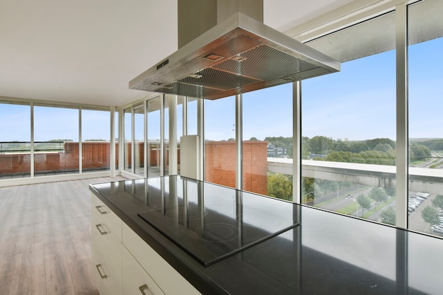 Photo bright kitchen with a luxury kitchen island in the elegant house