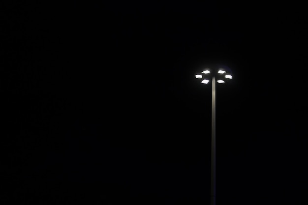 Bright lamppost in the pitchblack night