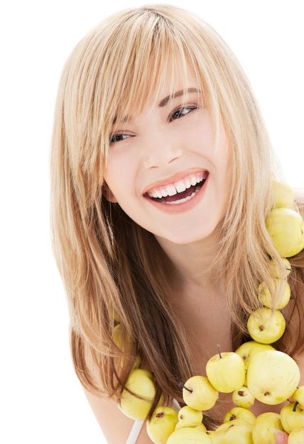 Photo bright lovely blonde with green apples