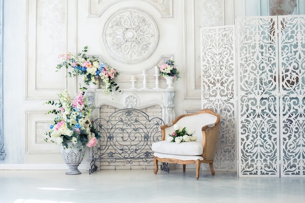 Bright luxury interior with flowers  