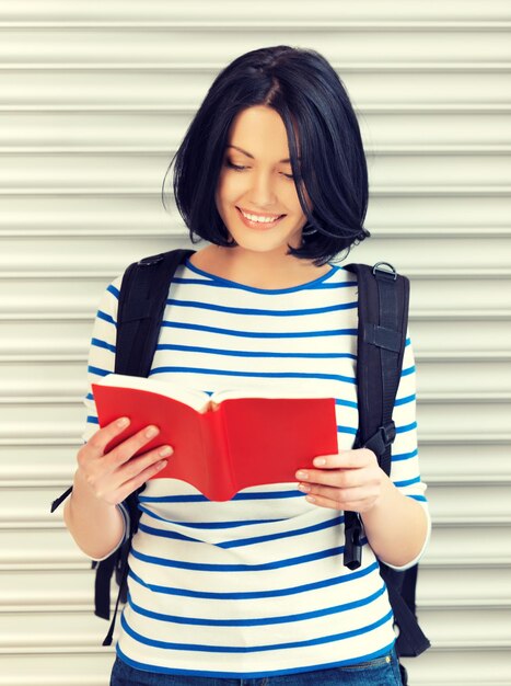 Photo bright picture of attractive woman with bag and book