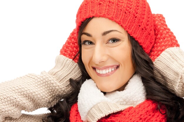 bright picture of beautiful woman in hat, muffler and mittens