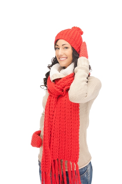 bright picture of beautiful woman in hat, muffler and mittens