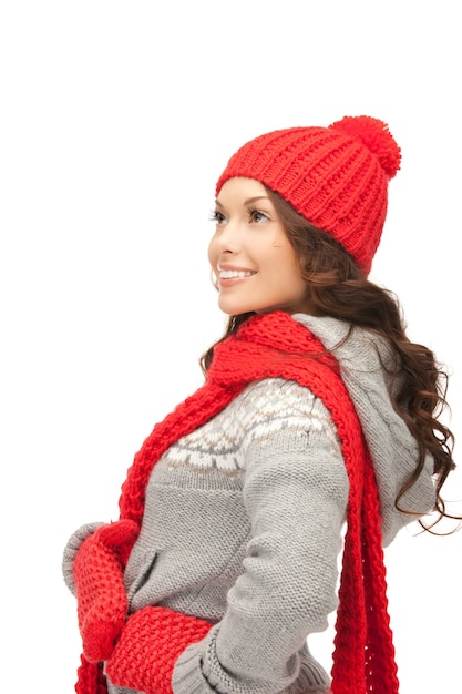 bright picture of beautiful woman in hat, muffler and mittens