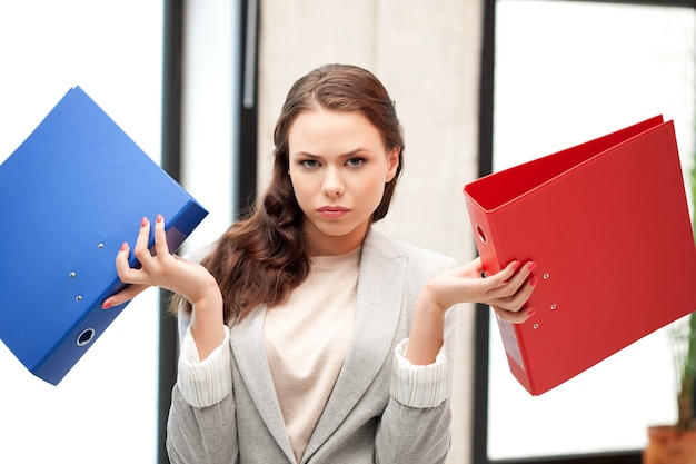 bright picture of beautiful woman with folders