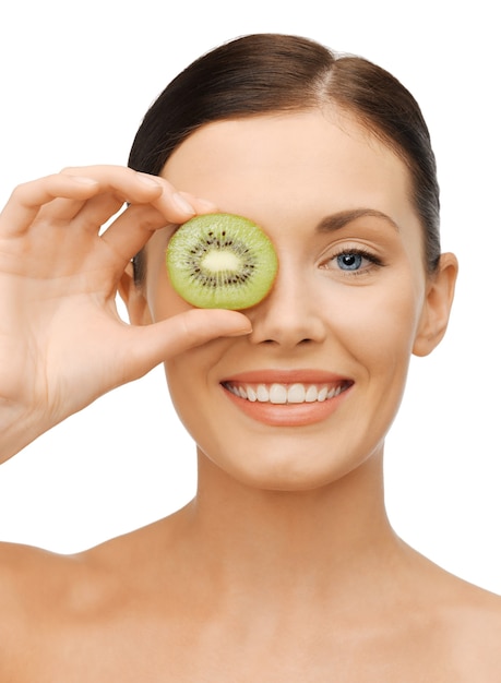 bright picture of beautiful woman with kiwi slice