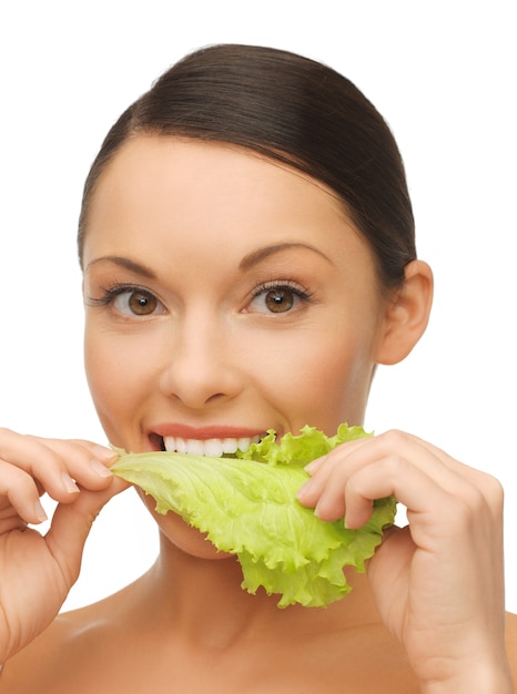 bright picture of beautiful woman with lettuce