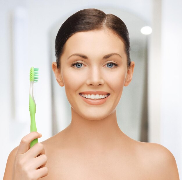 bright picture of beautiful woman with toothbrush