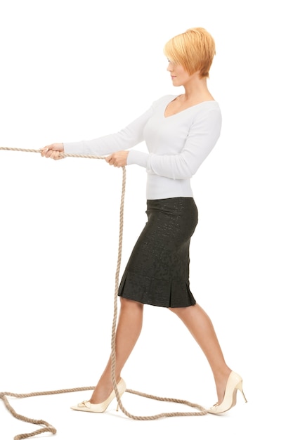 bright picture of business woman pulling rope